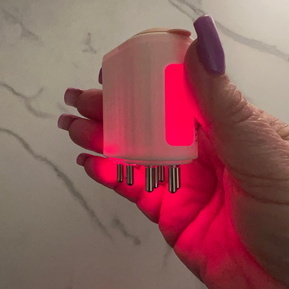 
                  
                    Rechargeable Massage Brush with LED Therapy
                  
                