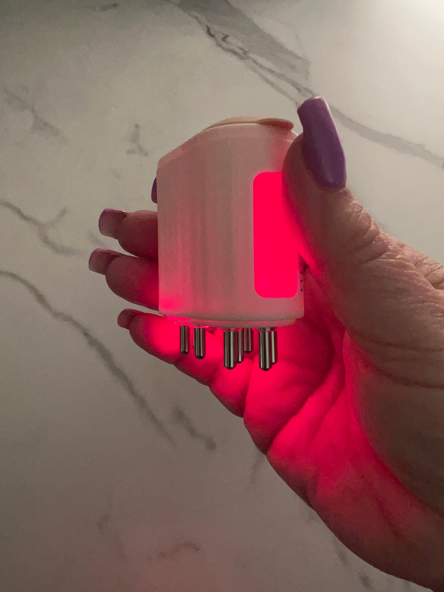 
                  
                    Rechargeable Massage Brush with LED Therapy
                  
                